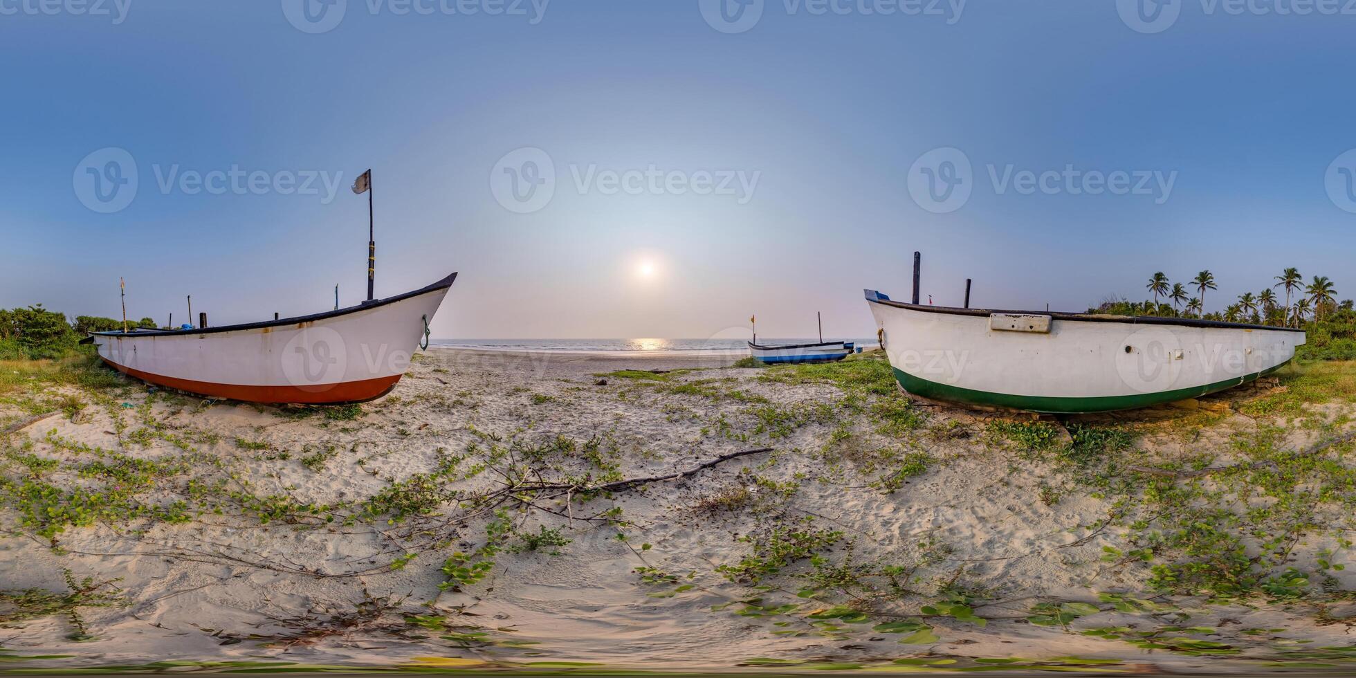 360 hdri panorama near old fishing boats in the sand on the ocean in equirectangular spherical seamless projection photo