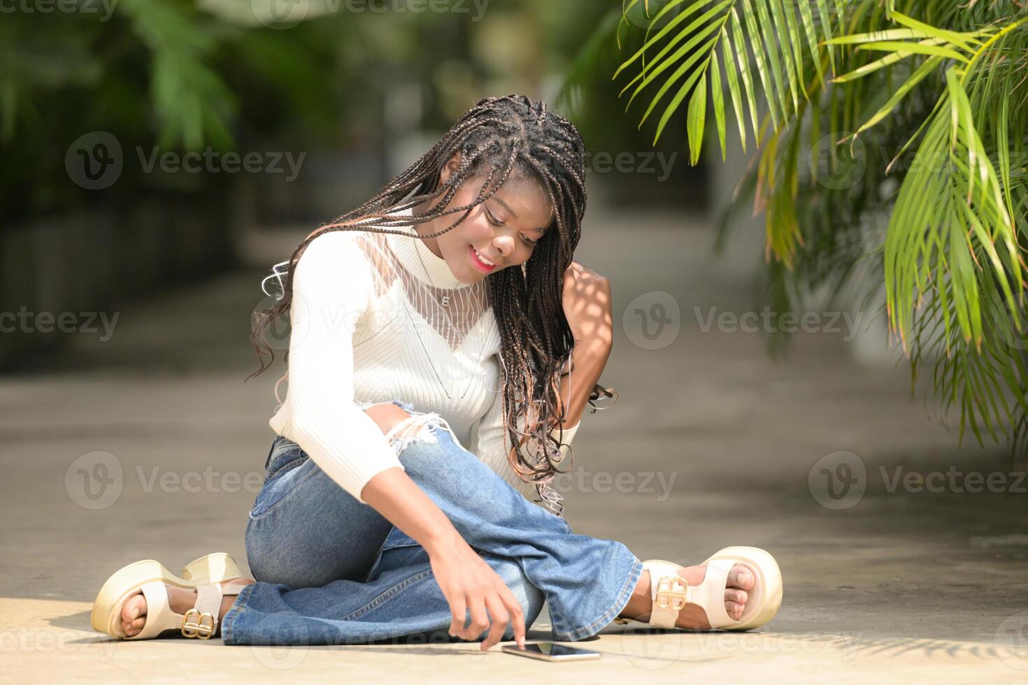 A young woman with his hairstyle and the atmosphere of living in the community. photo