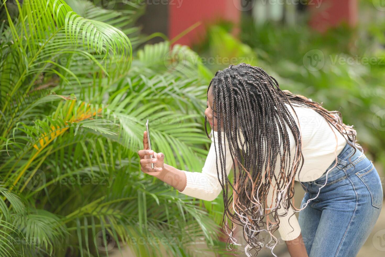 A young woman with his hairstyle and the atmosphere of living in the community. photo