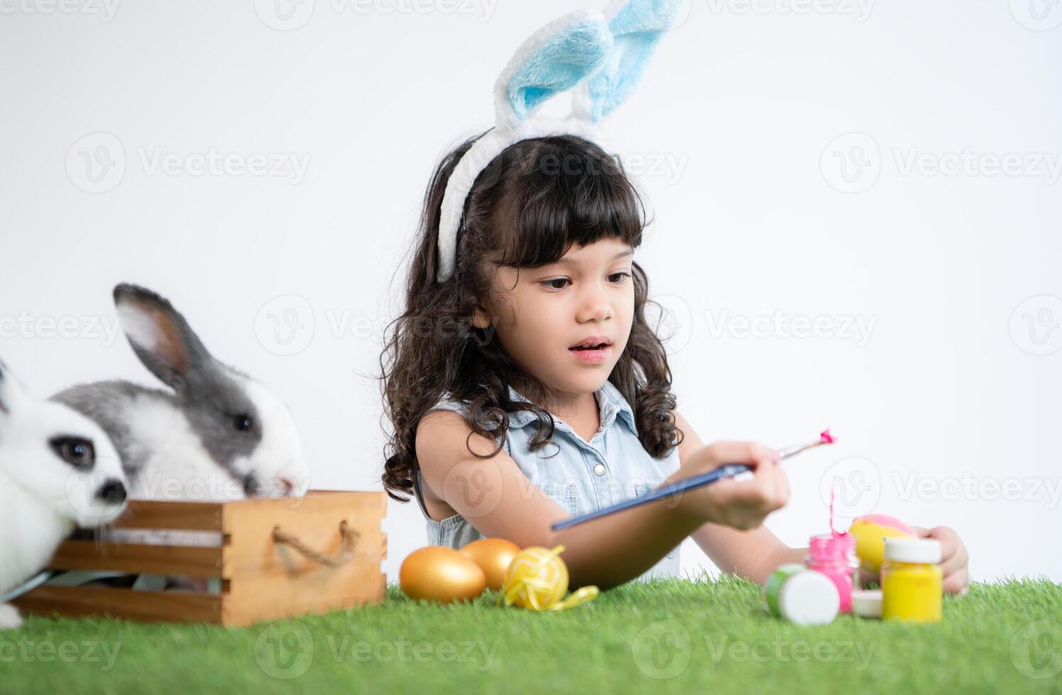 Easter bunny fun with little children the beauty of friendship between humans and animals photo