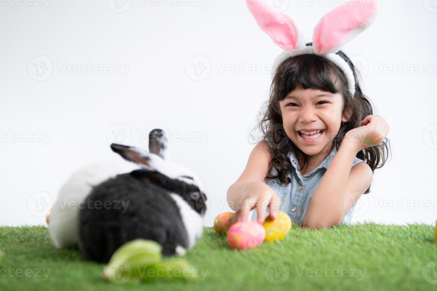 Easter bunny fun with little children the beauty of friendship between humans and animals photo