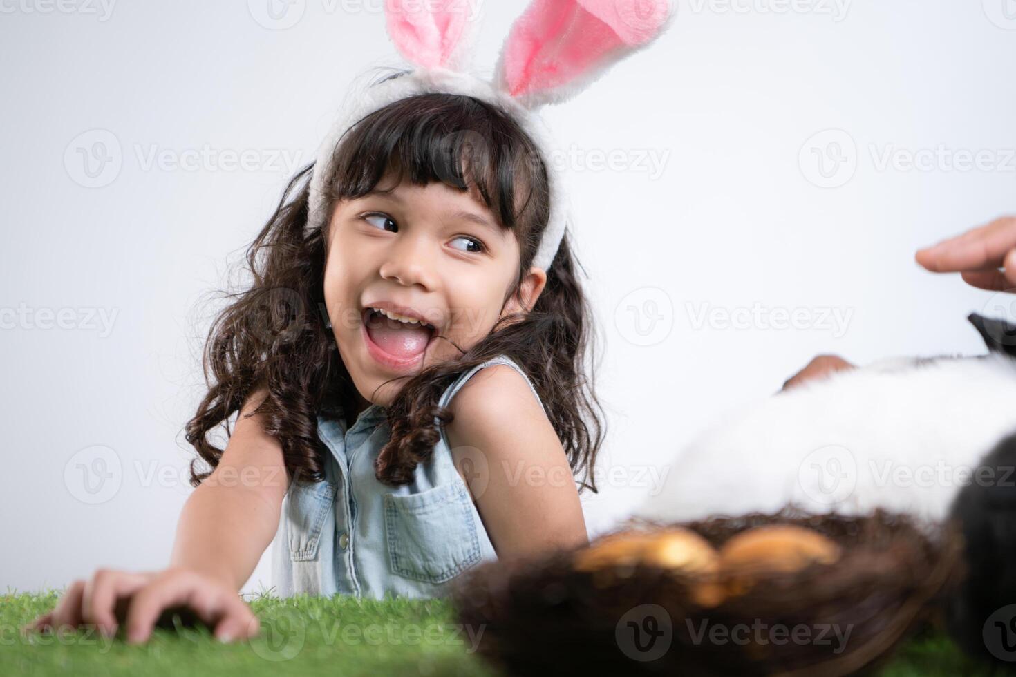 Easter bunny fun with little children the beauty of friendship between humans and animals photo