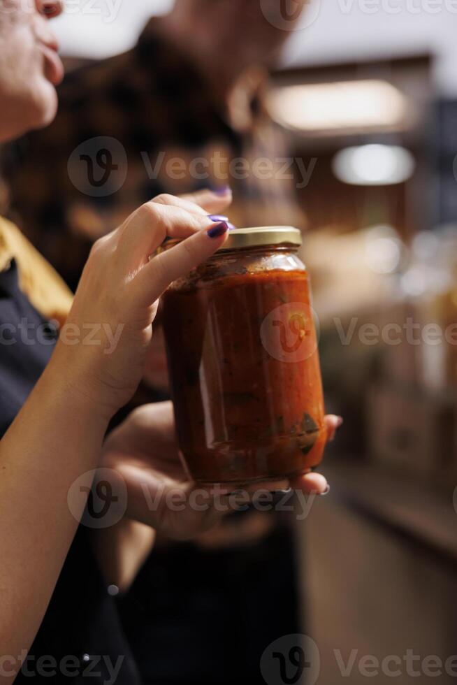 Father and daughter shopping in zero waste store looking for non GMO bulk products. Family members purchasing chemicals free pantry staples from local neighborhood shop, close up photo