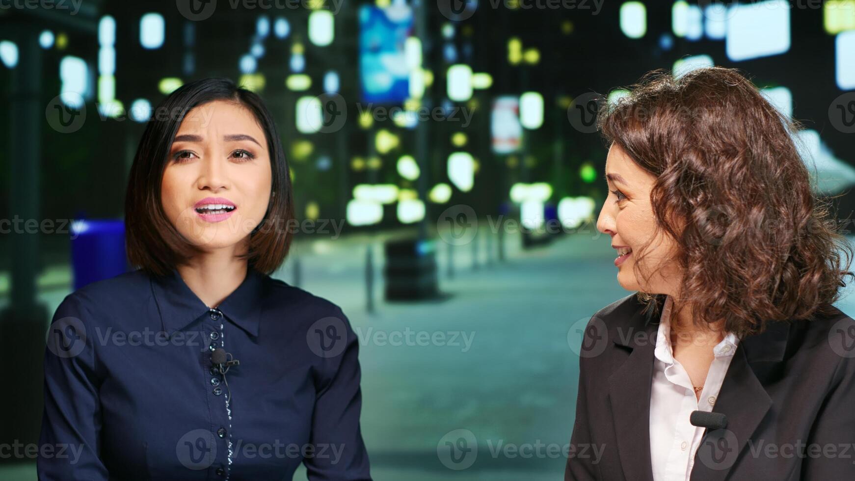 Journalists team on late night talk show presenting news on international broadcast channel, media advertisement. Two diverse women hosting new network program for daily news and events. photo