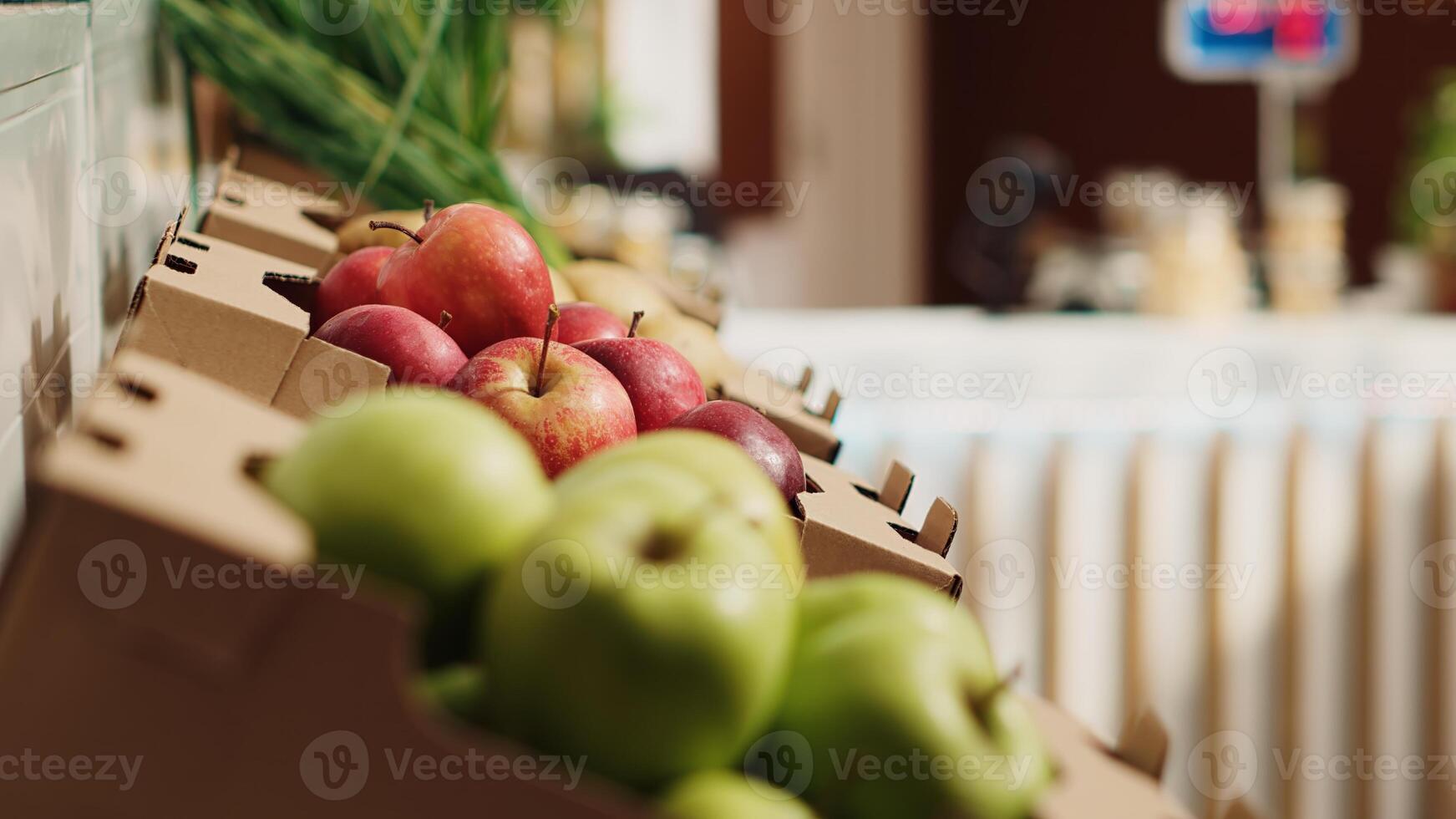 Close up panning shot of natural fruits and vegetables on farmers market shelves. Freshly harvested additives free food items in environmentally responsible zero waste supermarket photo
