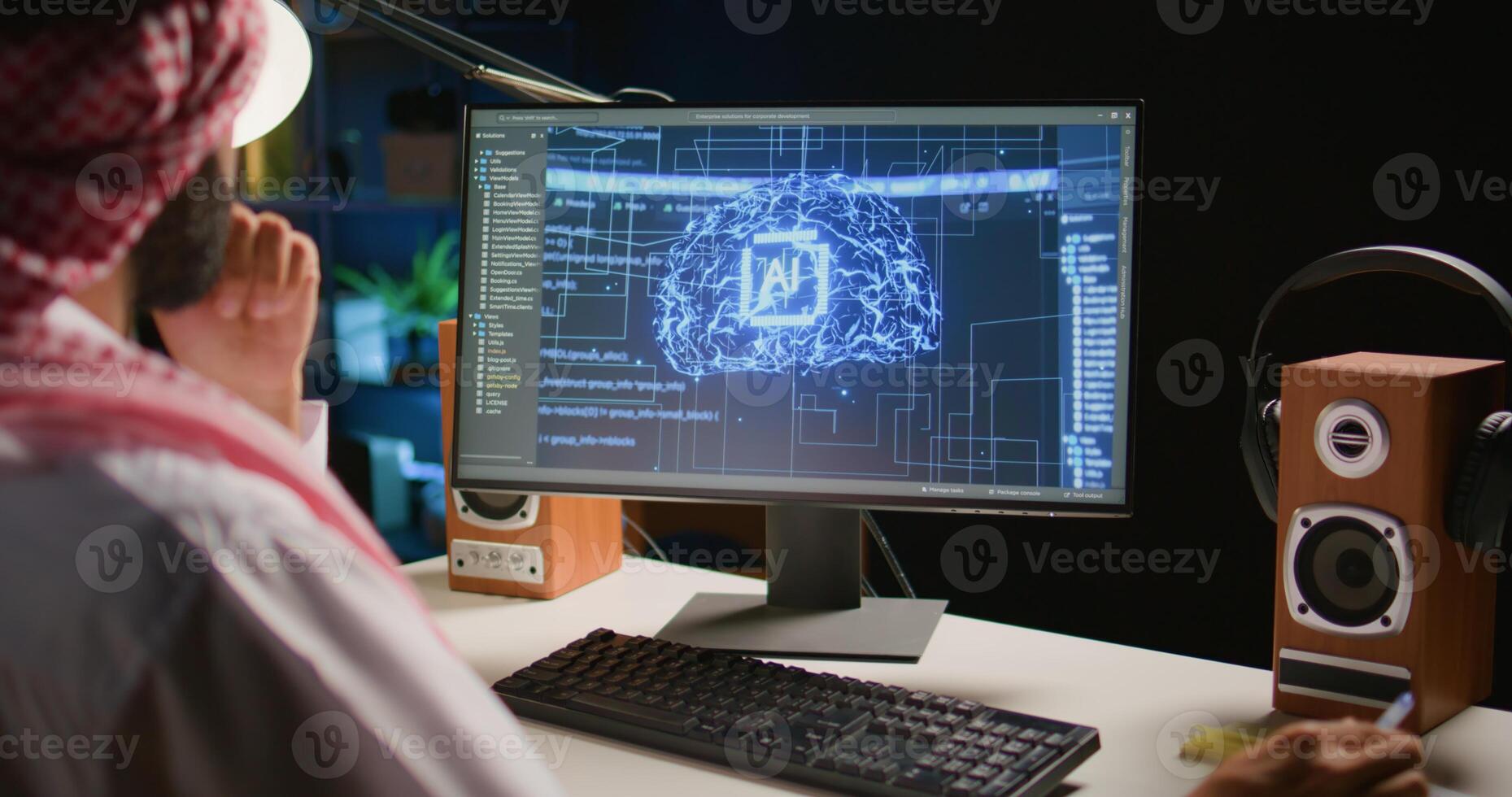 Qualified data scientist updating neural networks, writing complex binary code scripts. Certified teleworking man in home office uses digital device programming to upgrade AI photo