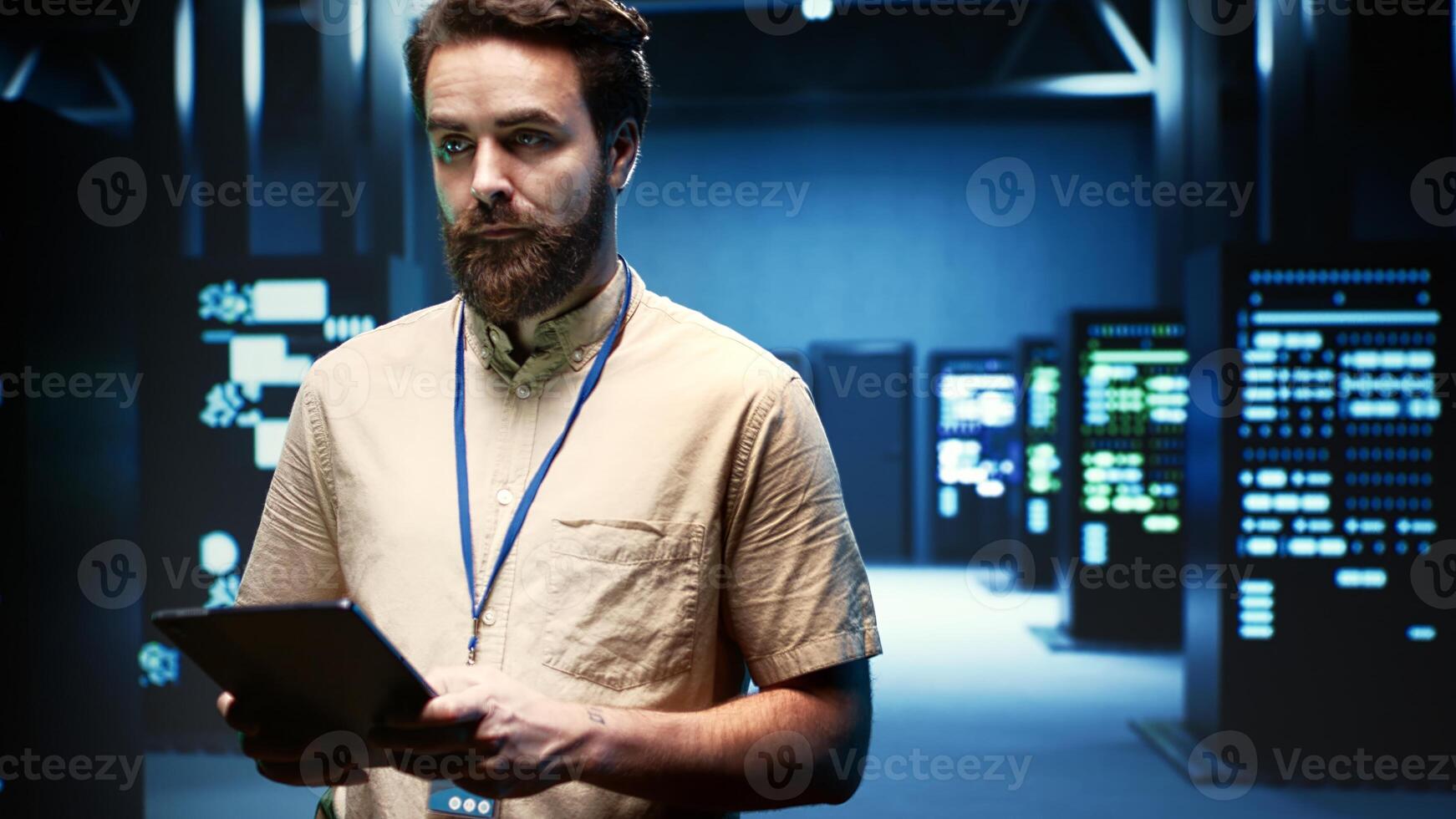 Expert preparing server room recovery plan monitoring data center energy consumption across components, ensuring sensors are functioning optimally, performing routine disk checks photo