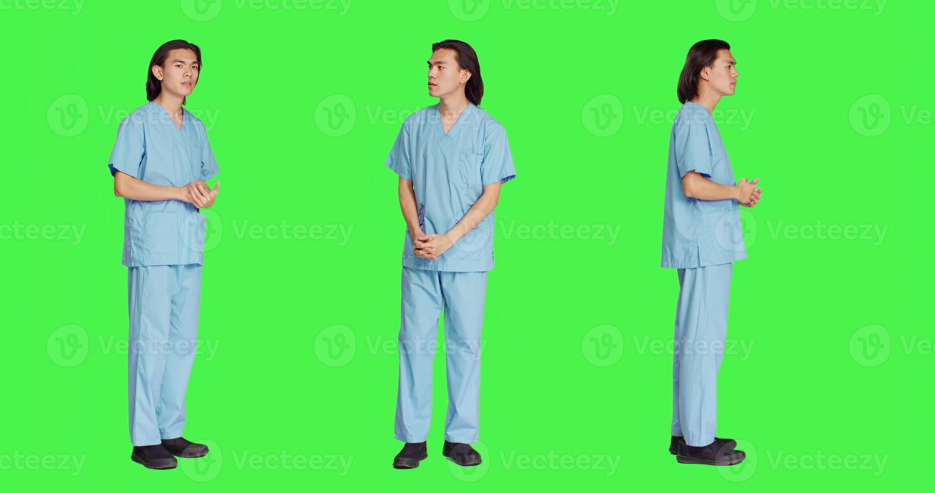Medical specialist waiting and looking for something over greenscreen studio, wearing clinic uniform and being impatient. Nurse medic with healthcare expertise, wellness occupation. photo