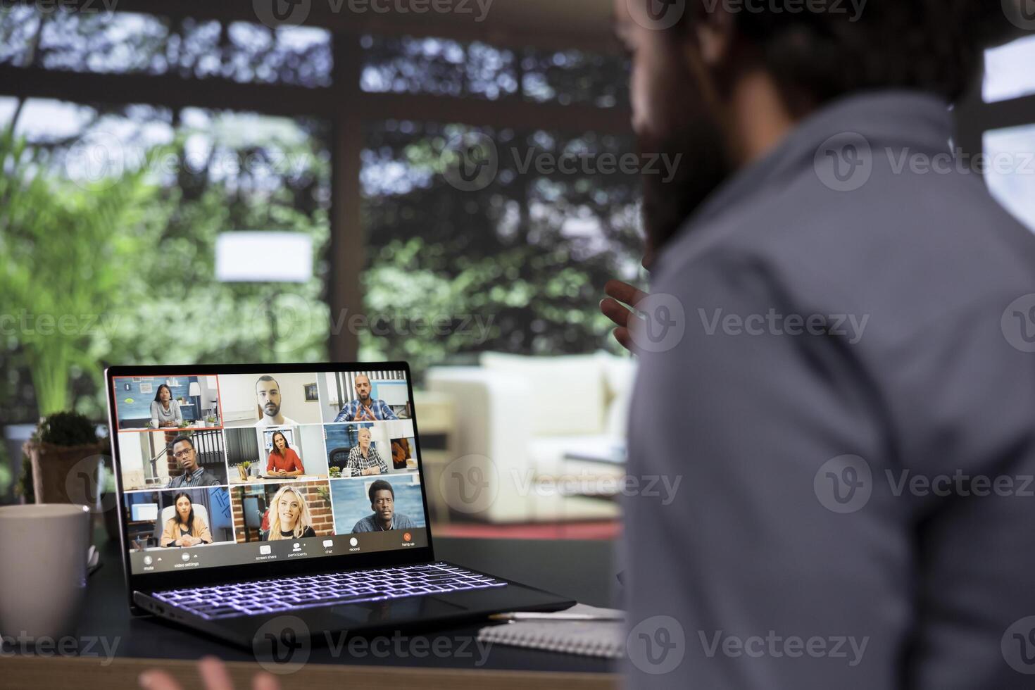 Chairman presenting new business expansion plans on videoconference, explaining his ideas and suggestions to executive board members. Businessman pitching tactics for partners on videocall. photo