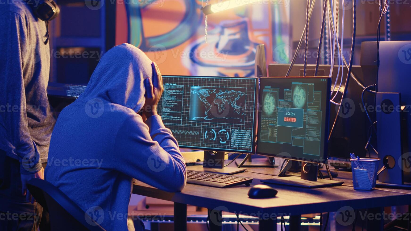 BIPOC hackers in secret headquarters targeting vulnerable unpatched connections, frustrated after failing to get past computer defenses and steal valuable sensitive data, access denied error photo