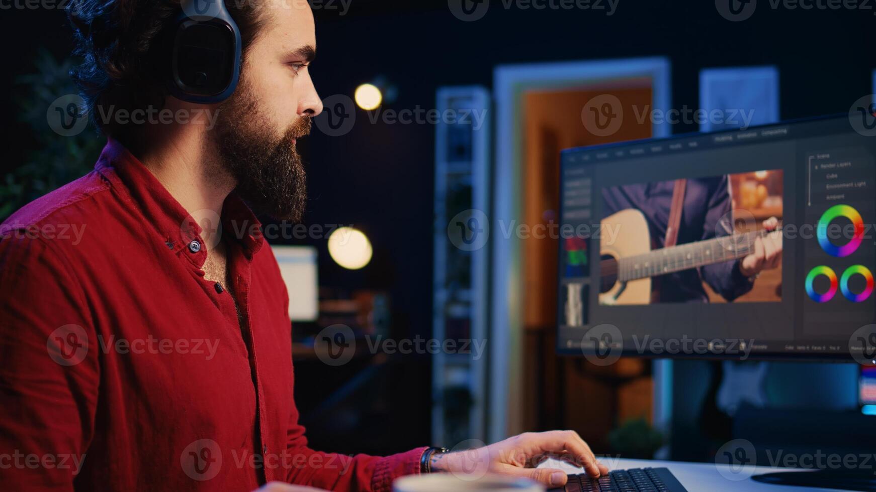 Video editor adds sound effects to filmed footage, working in post production office studio, panning shot. Videographer using headphones to test and improve audio quality using editing tools photo