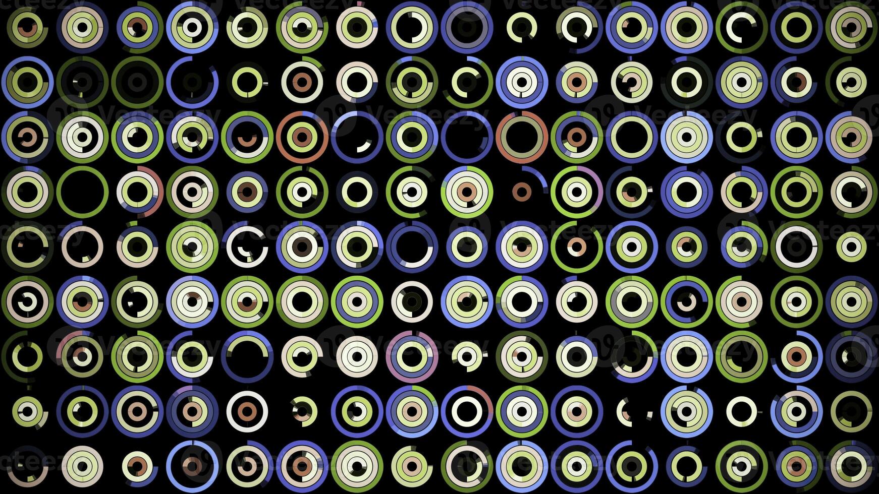 Plenty of small multicolored circles spinning on the black background in different sequence. Animation. Beautiful abstract background. photo