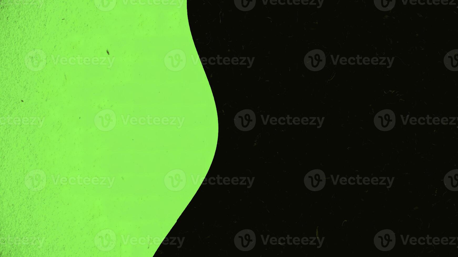 Colored background moves in wavy line on black background. Animation. Illusion of wavy movement of two backgrounds superimposed on each other. Colored background on black is slowly moving in wave photo