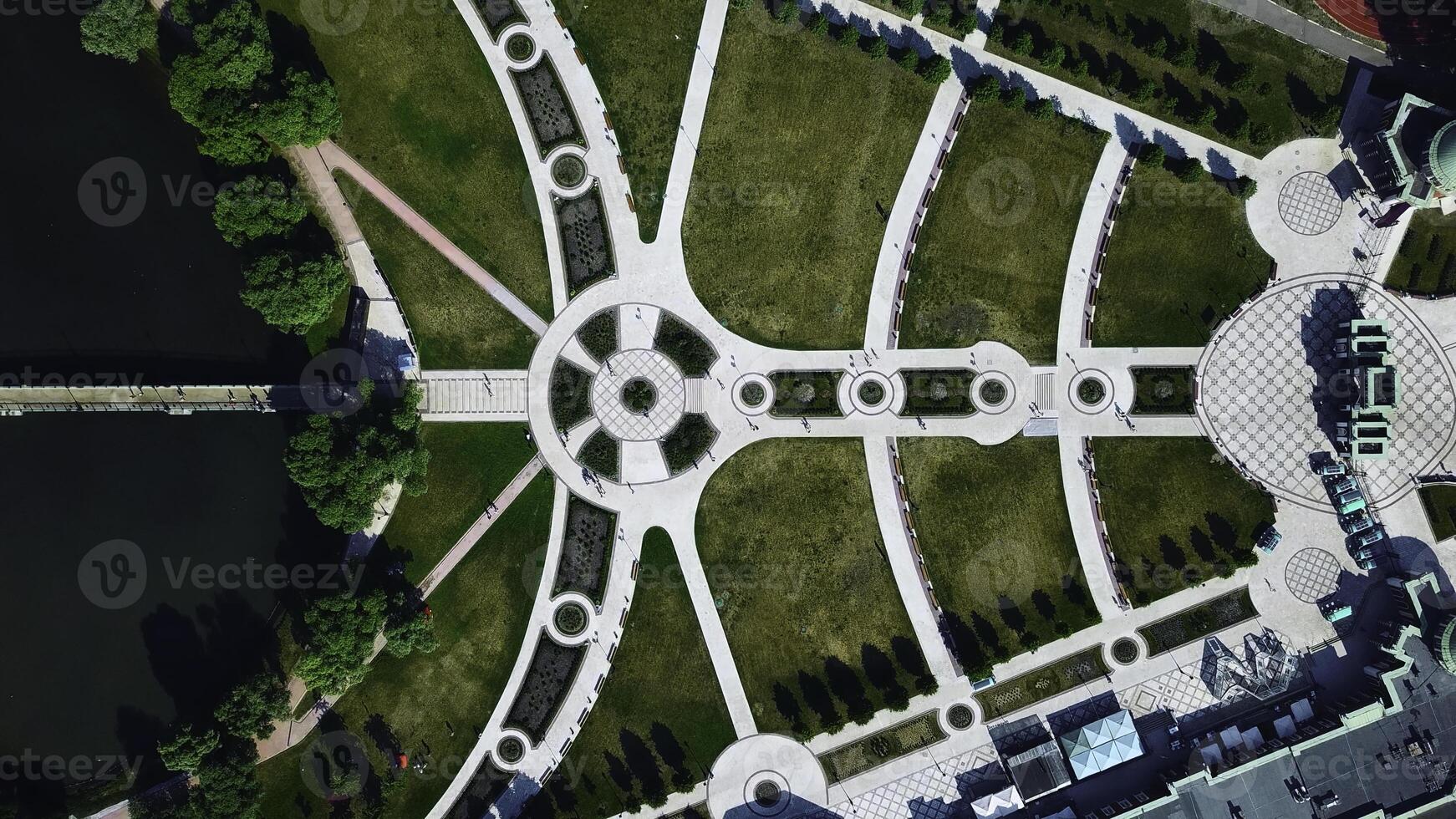 Landscaped geometric garden. Creative. Top view of geometric trails with pattern. People walk in historical park with geometric landscape photo