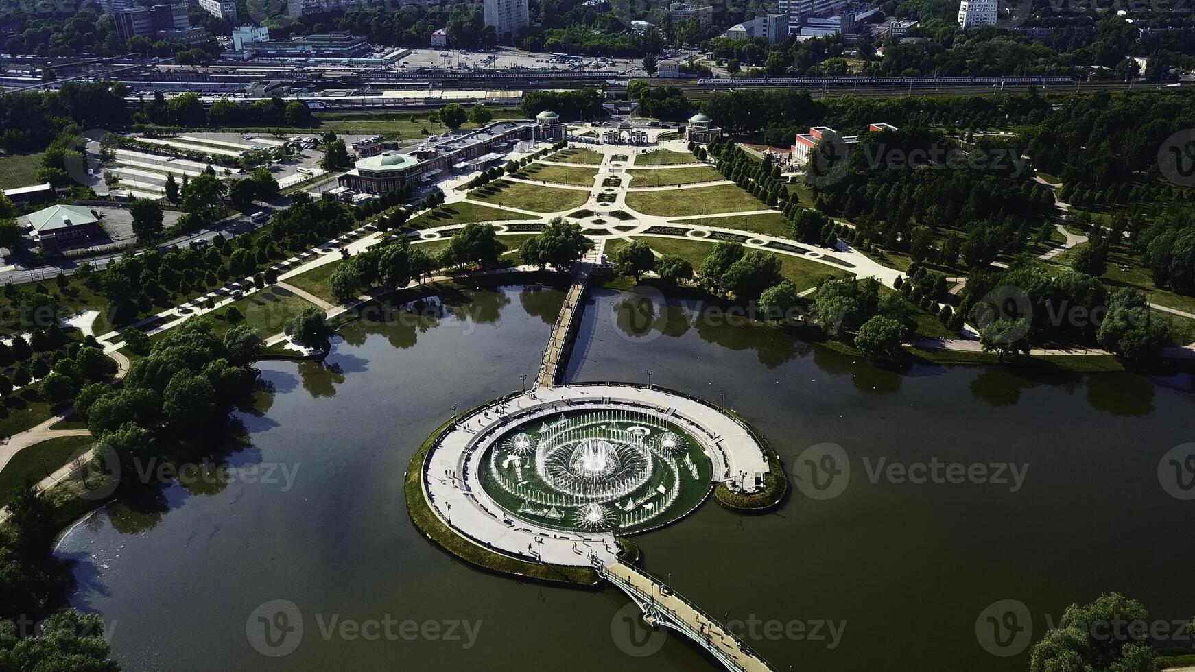 Geometric landscape paths and fountains. Creative. Top view of ornamental park with paths and fountain. Historical park with fountain in pond and luxurious geometric alley photo