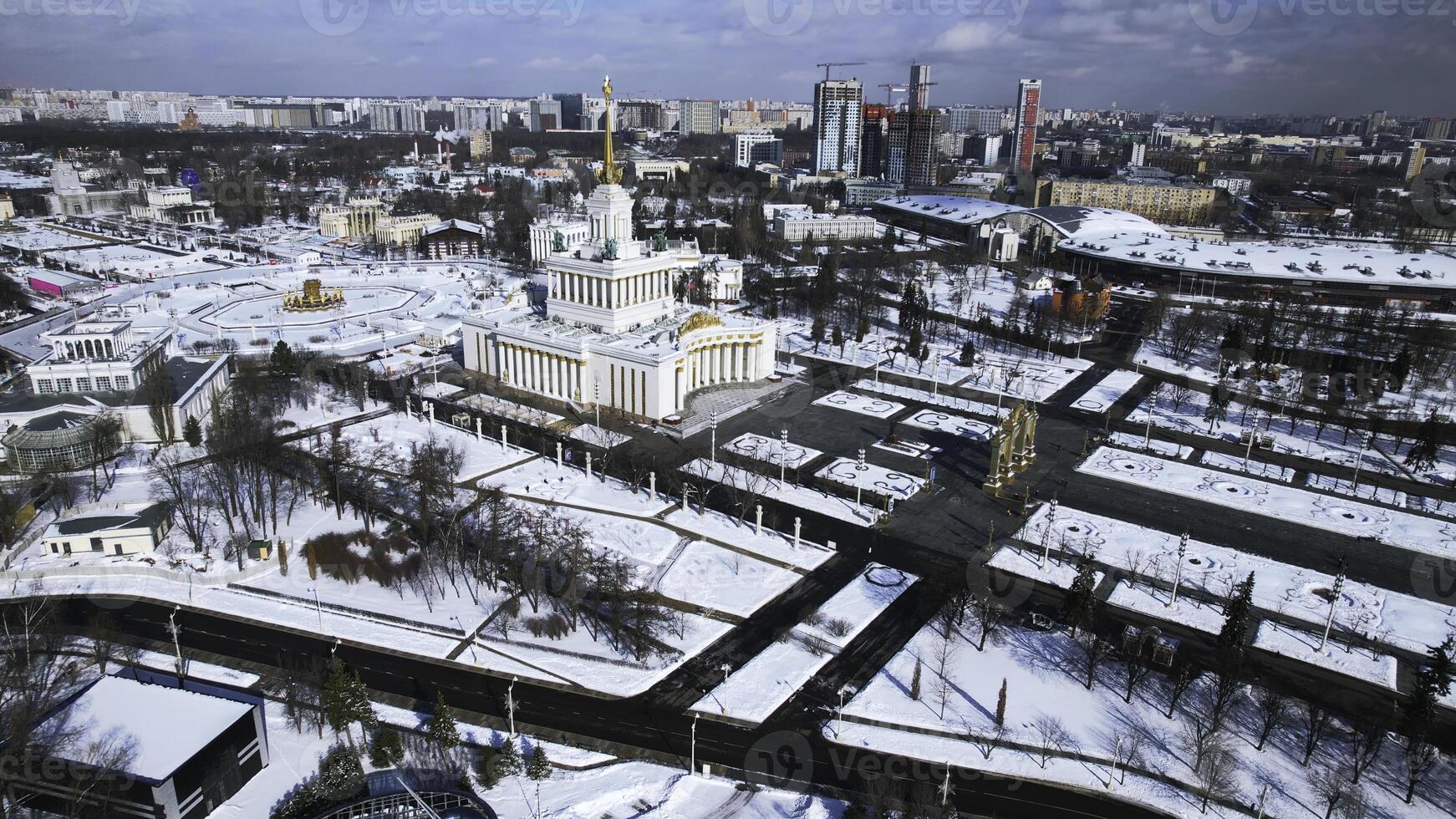 Top view of square with historical building in winter. Creative. center of the Soviet city with square and historical building. Beautiful urban landscape with historical center and square in winter photo