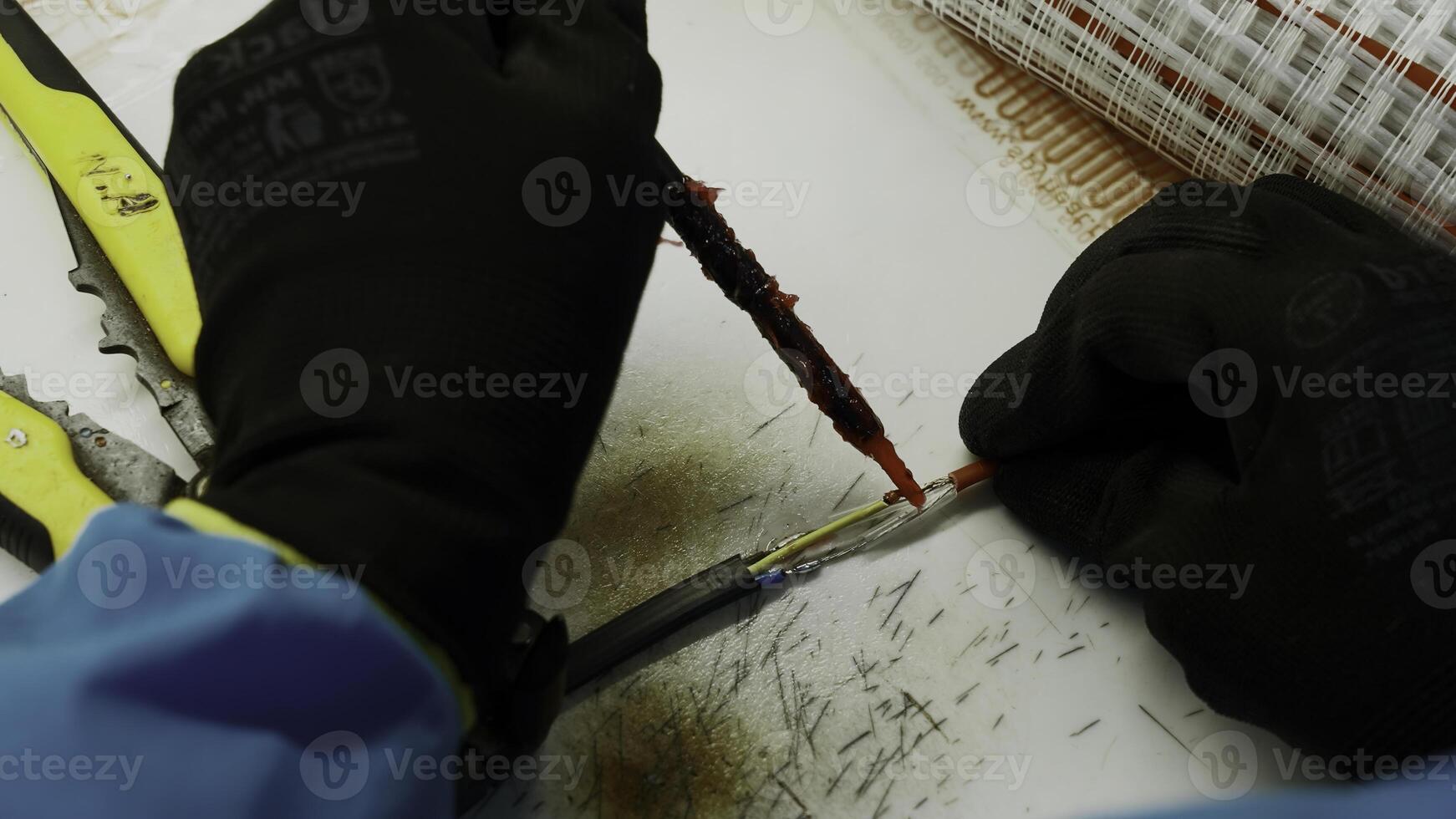 Close up of an electrical soldering wires with special equipment. Creative. Process of repairing wires. photo