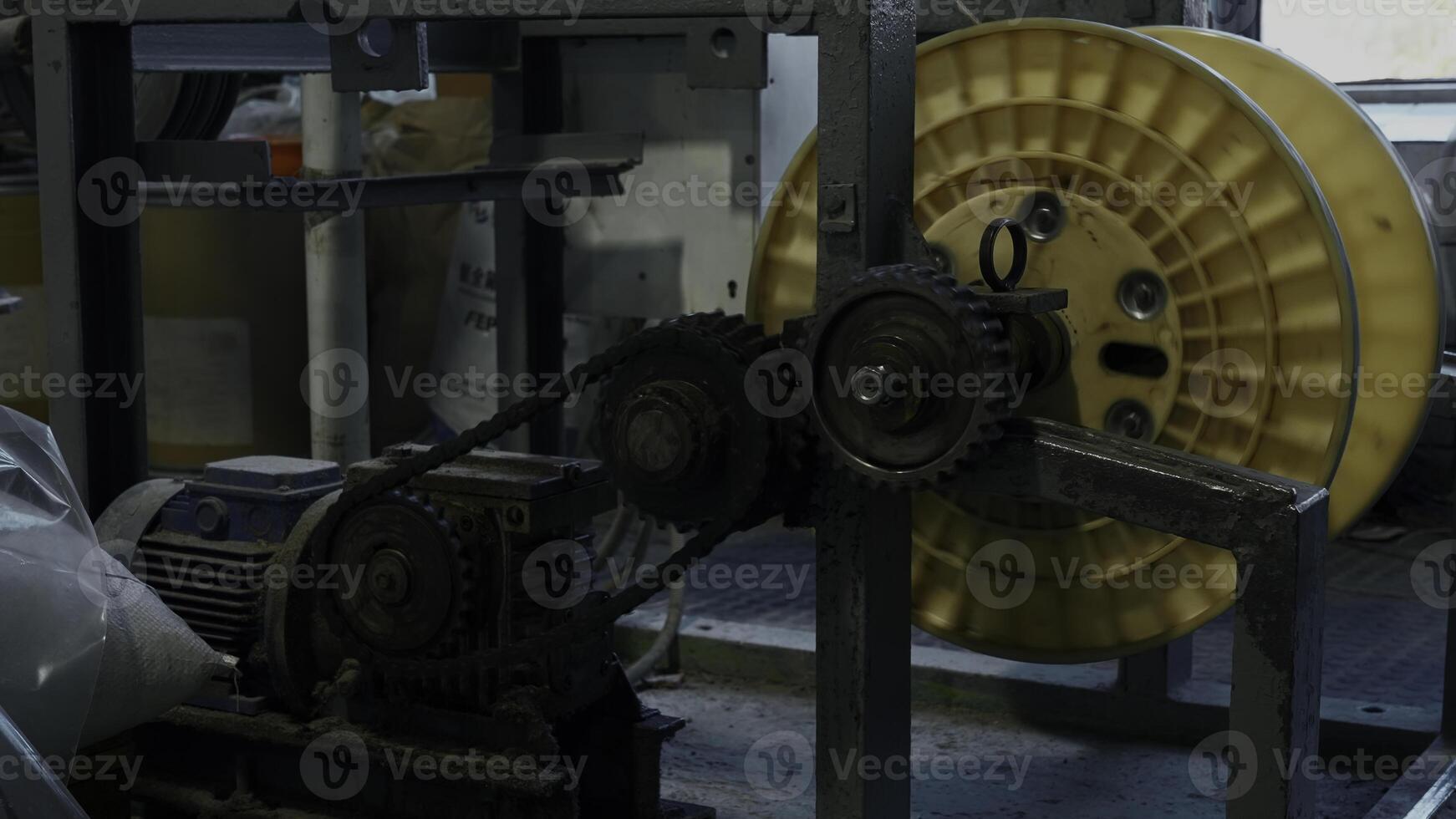 A mechanism with rotating gears. Creative. Industrial background at the workshop. photo