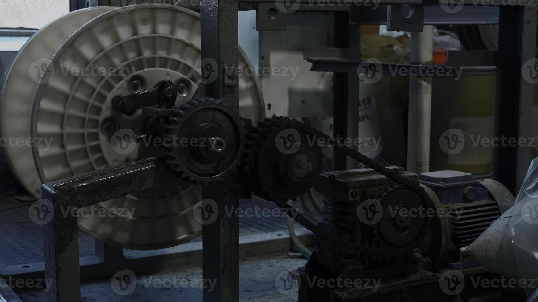 A mechanism with rotating gears. Creative. Industrial background at the workshop. photo