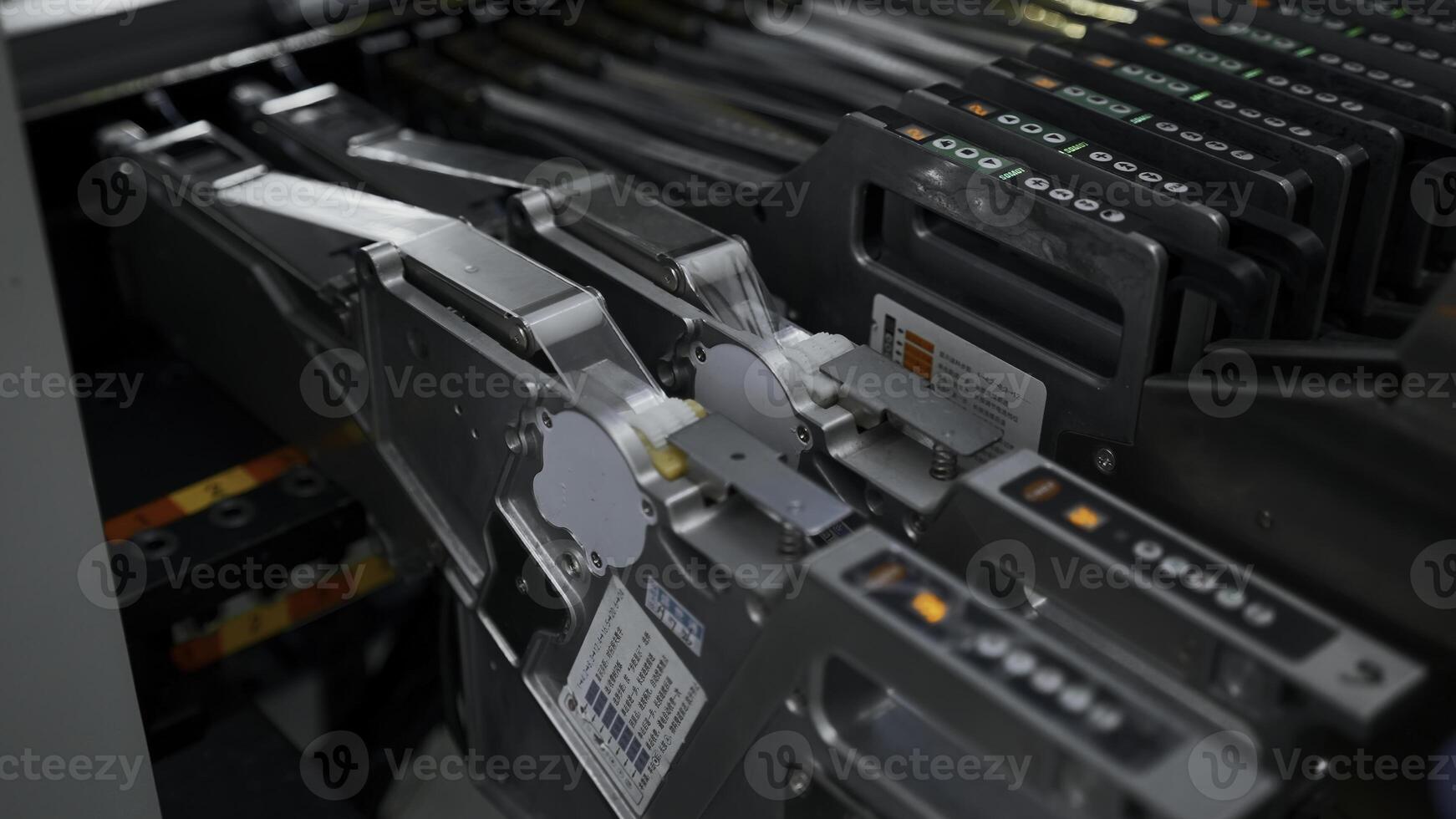 Close up of hands of engineer hands checking electronic circuit board machine. Creative. High tech industrial background. photo