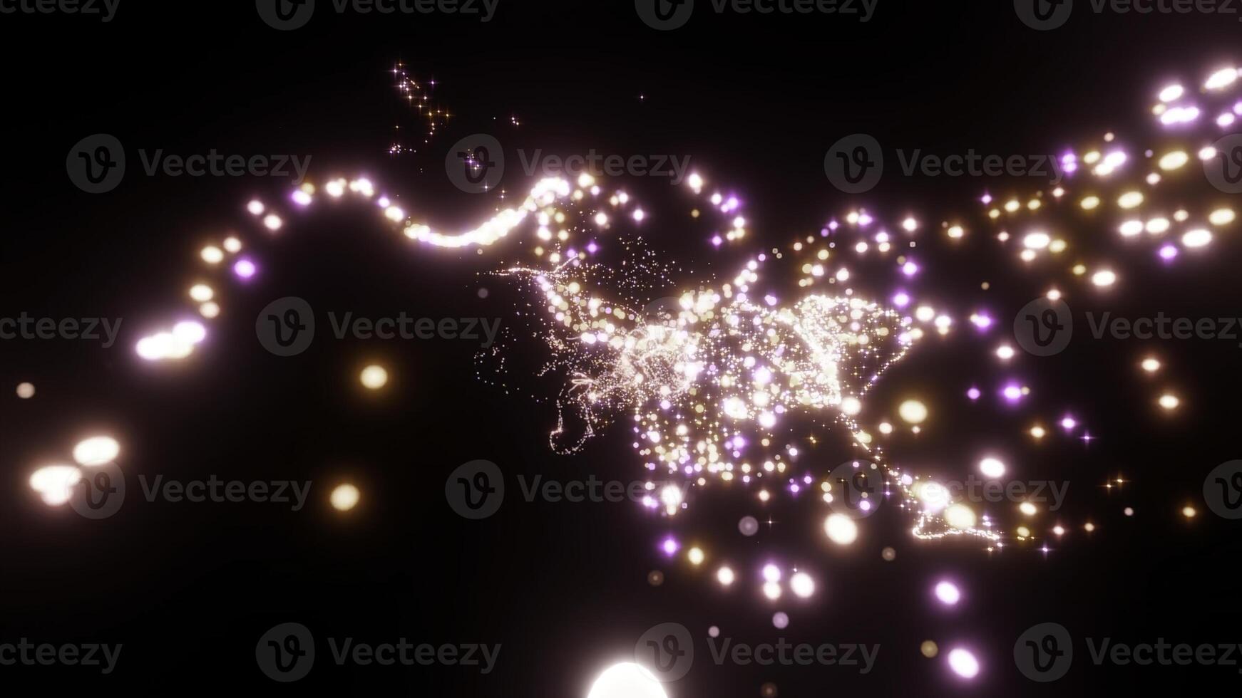 Abstract golden magic glitter particles flight in air and forming beautiful swirls. Design. Fiery sparkles flowing on a black background. photo