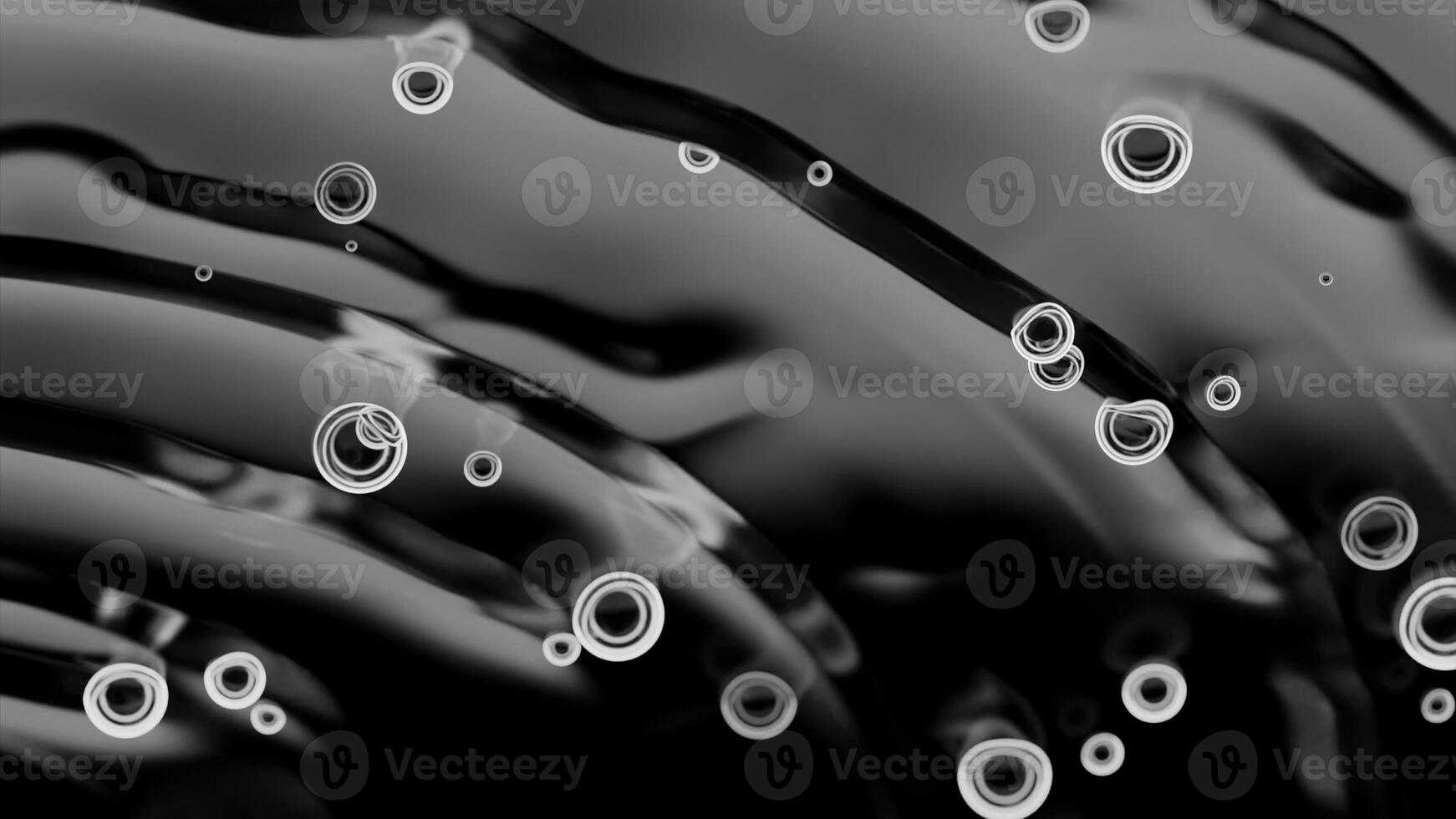 Top view of drops falling into water surface and diverging circles in slow motion. Design. Bubbles of air or drops and ripples. photo