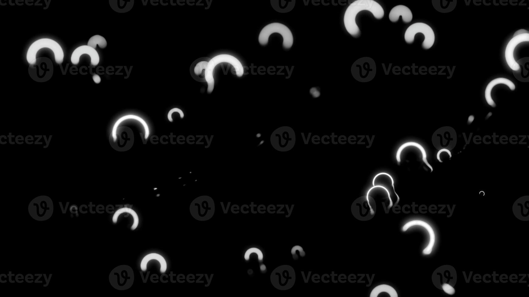 Jumping tiny arcuate neon shapes on a black background. Design. Small particles falling down of bubbles. photo