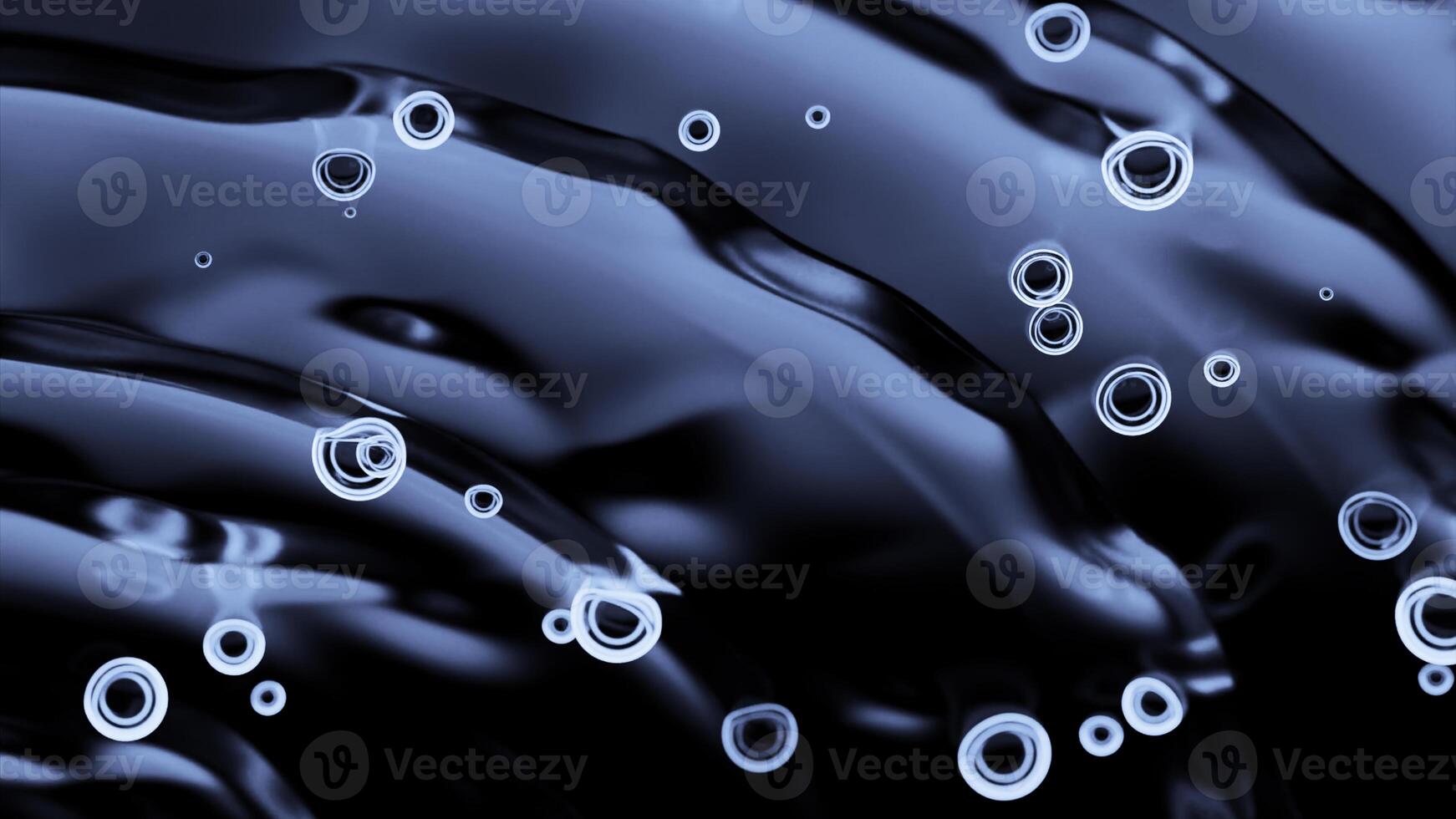 Top view of drops falling into water surface and diverging circles in slow motion. Design. Bubbles of air or drops and ripples. photo