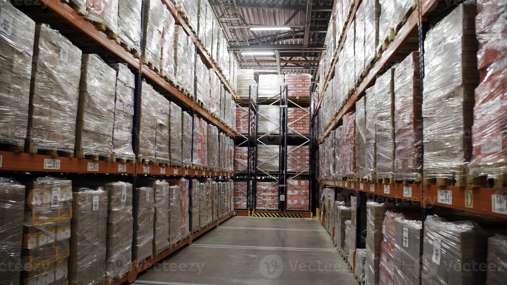 Storage corridor with endless packed boxes of goods. Creative. Concept of worldwide sales. photo