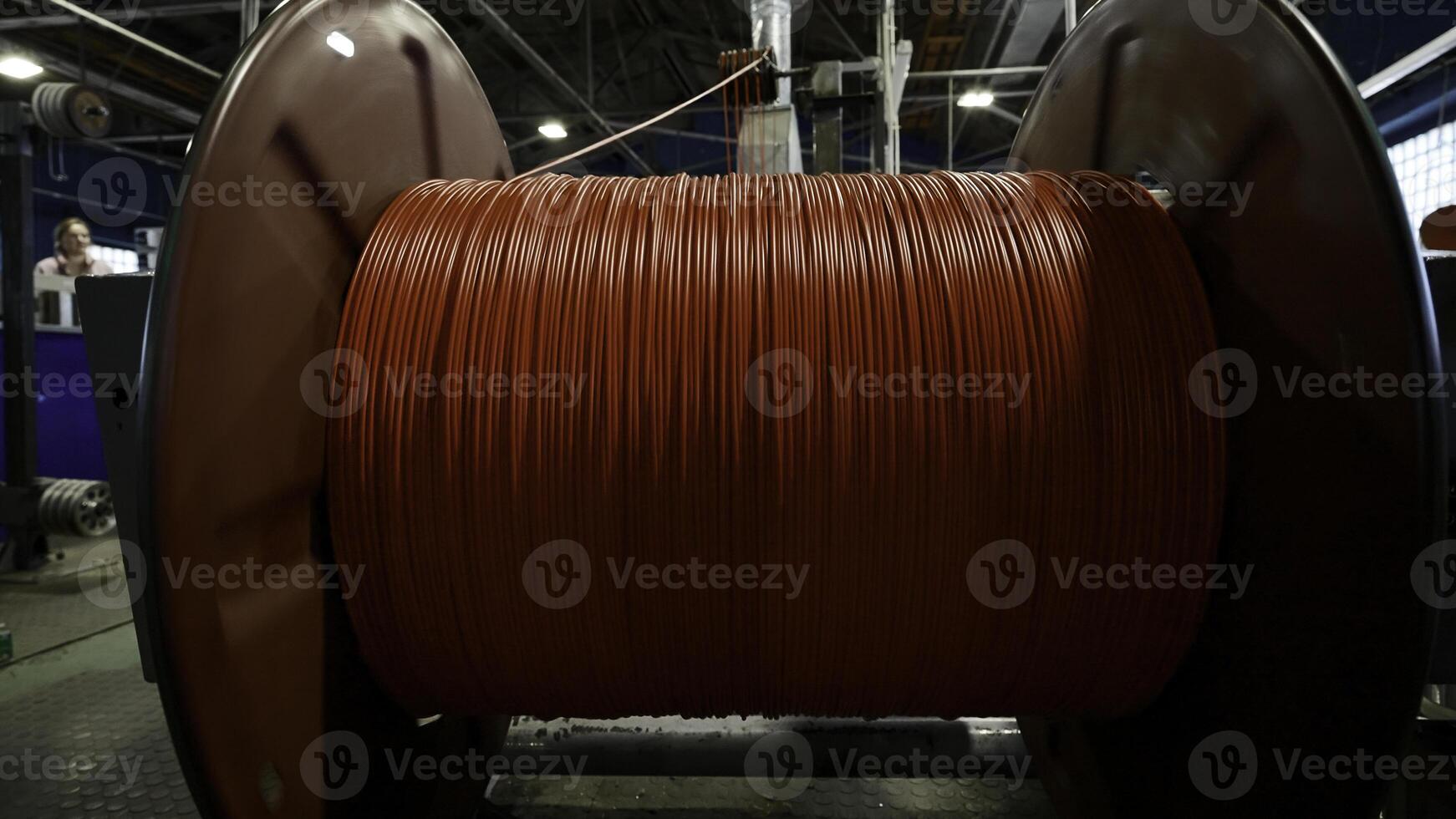 Cable production workshop and large coil. Creative. Modern cable manufacturing factory details. photo