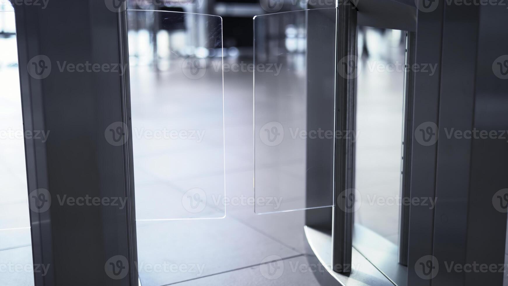 Man passing through the security gates. Media. Man using turnstile to enter the shopping center or subway. photo