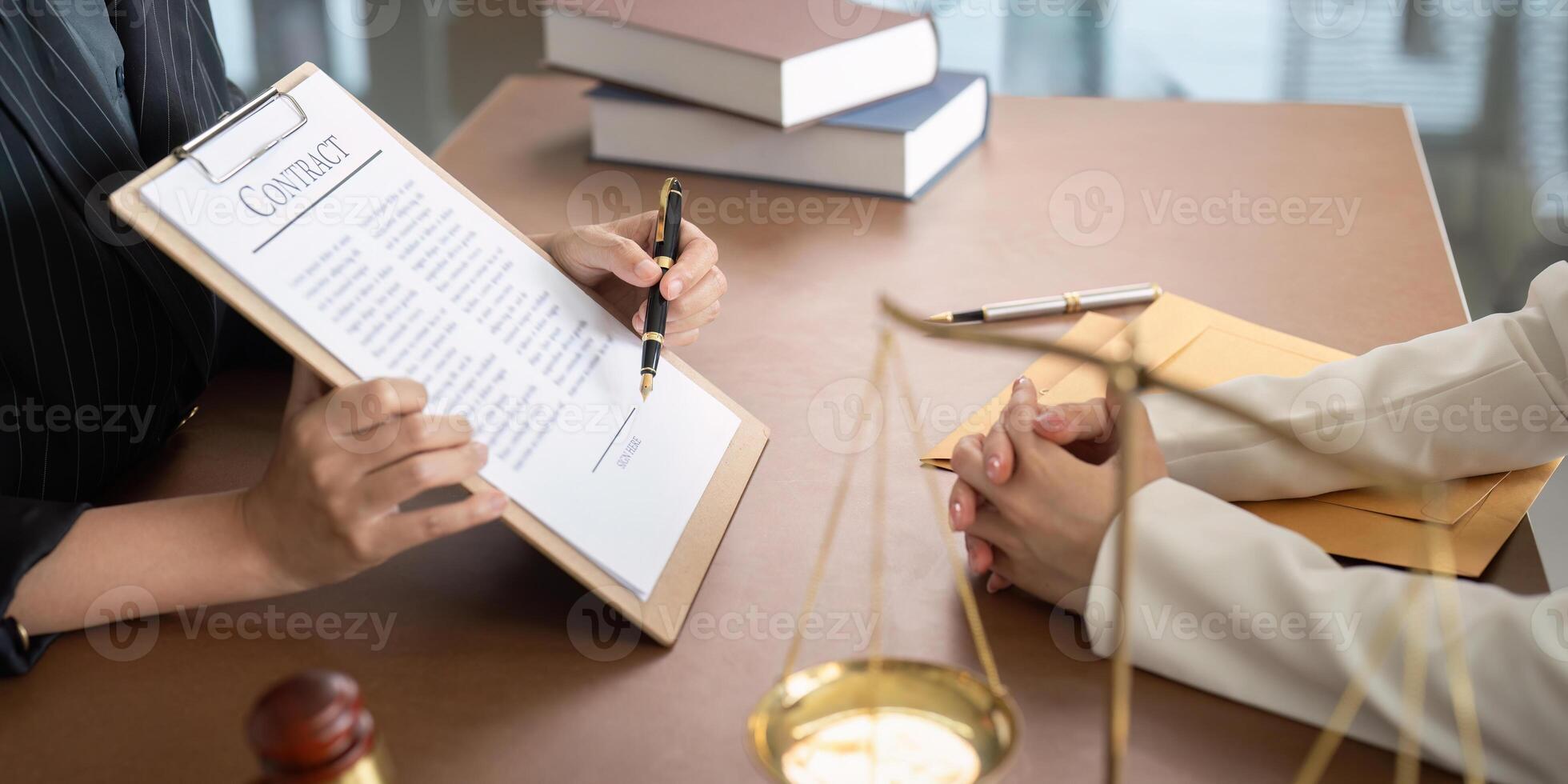 Contract of sale was on the table in the lawyer office the company hired the lawyer office as a legal advisor and draft the contract so that the client could signs the right contract photo