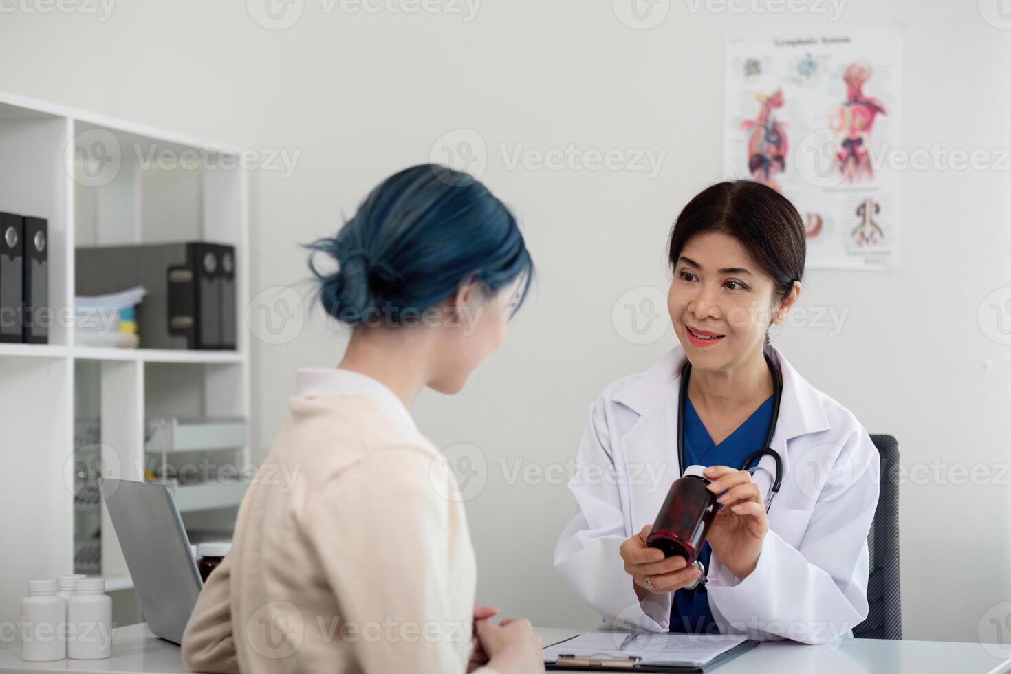 Doctor women senior for healthcare, hospital and support with test results or exam . Senior nurse and woman patient clinic up and medical consultation photo