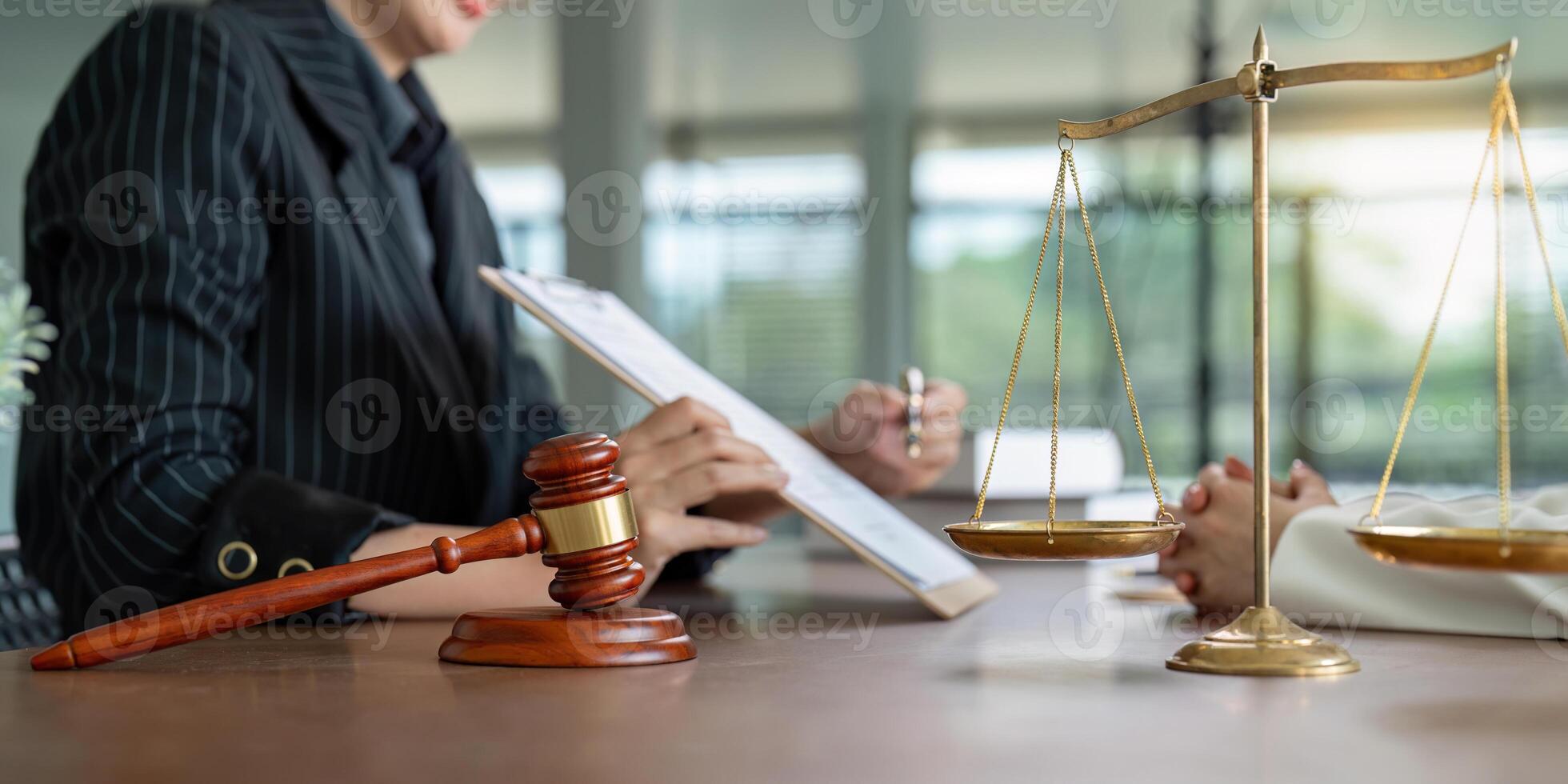 Contract of sale was on the table in the lawyer office the company hired the lawyer office as a legal advisor and draft the contract so that the client could signs the right contract photo