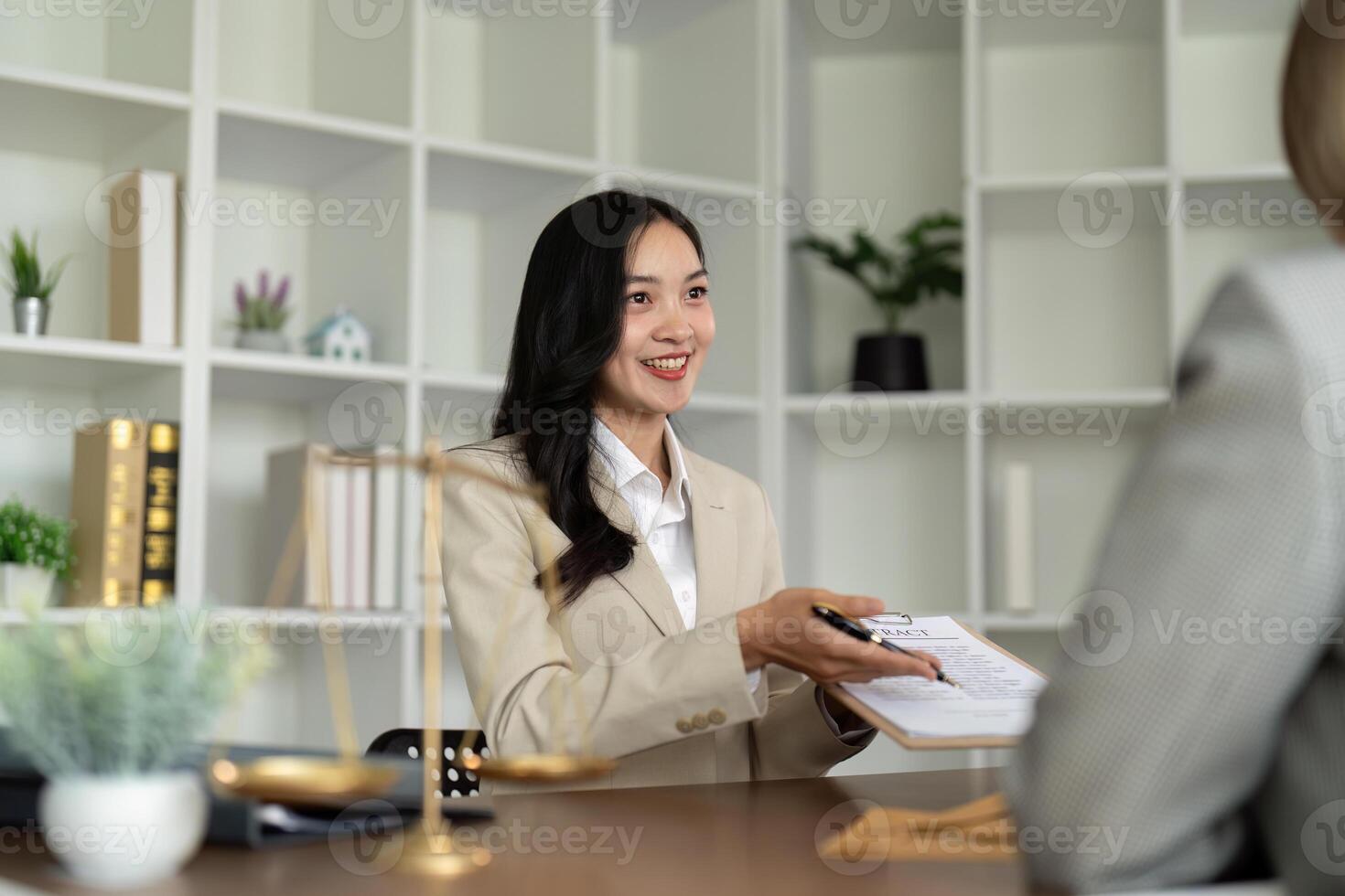 Company hired the lawyer office as a legal advisor and draft the contract so that the client could signs the right contract. Contract of sale was on the table in the lawyer office photo