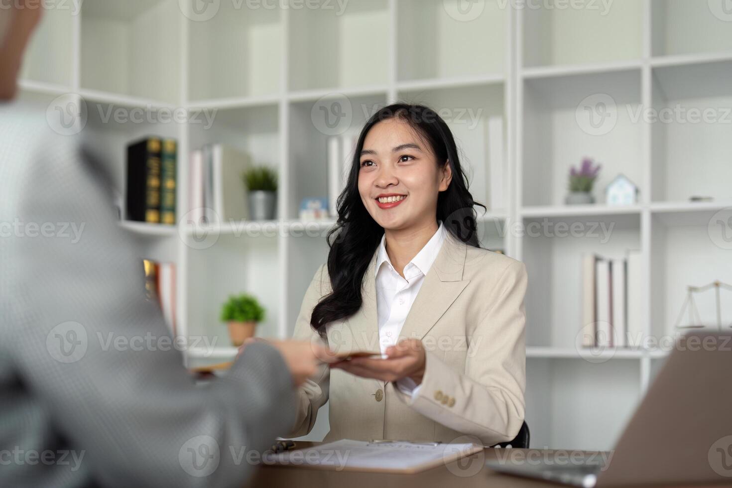 Company hired the lawyer office as a legal advisor and draft the contract so that the client could signs the right contract. Contract of sale was on the table in the lawyer office photo