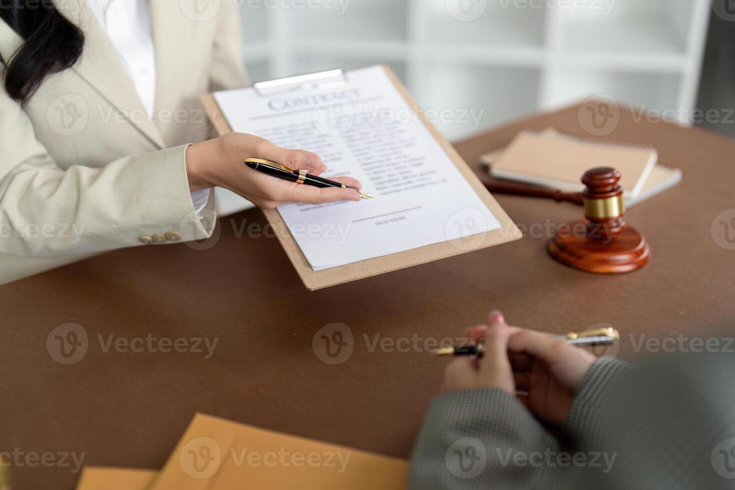 Consultation and conference of lawyer and business people discussion at law firm in office. Concepts of law, Judge gavel with scales of justice photo