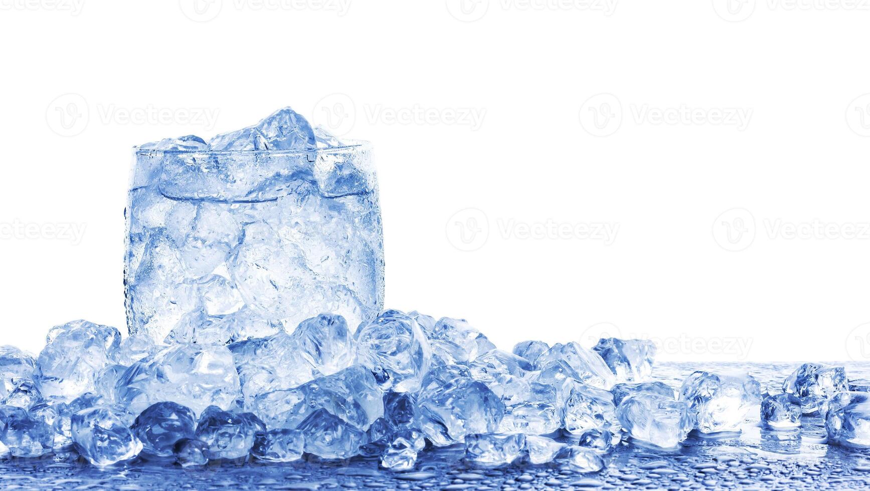 Water with crushed ice cubes in glass isolated on white background photo