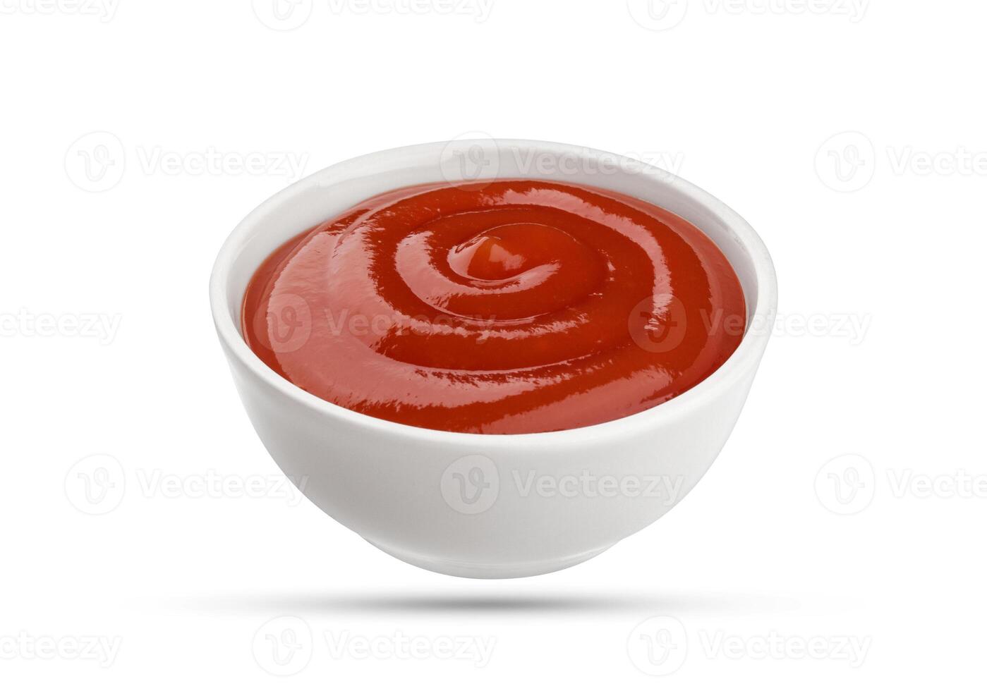 Ketchup bowl isolated on white background photo