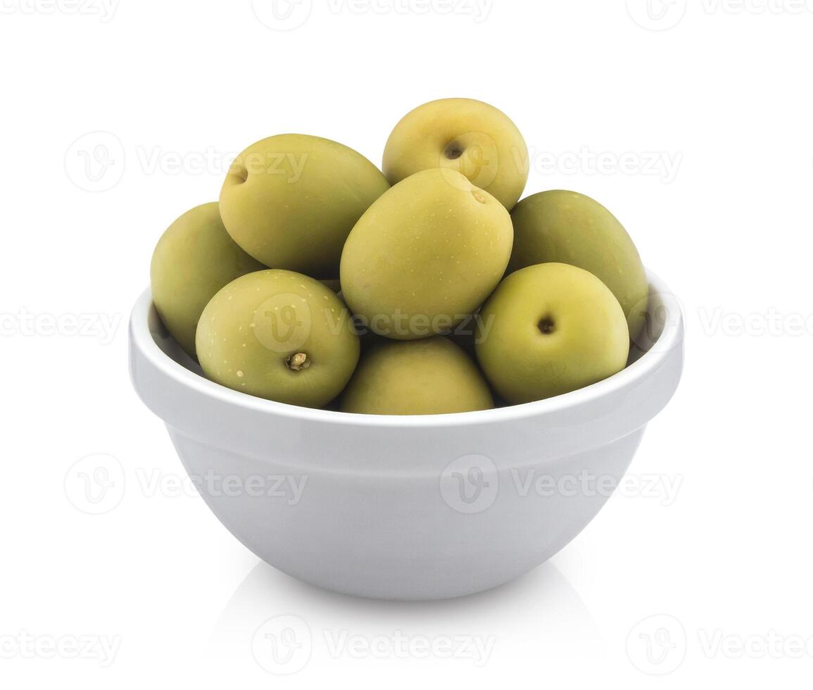 Green olives in bowl isolated on white background with clipping path photo