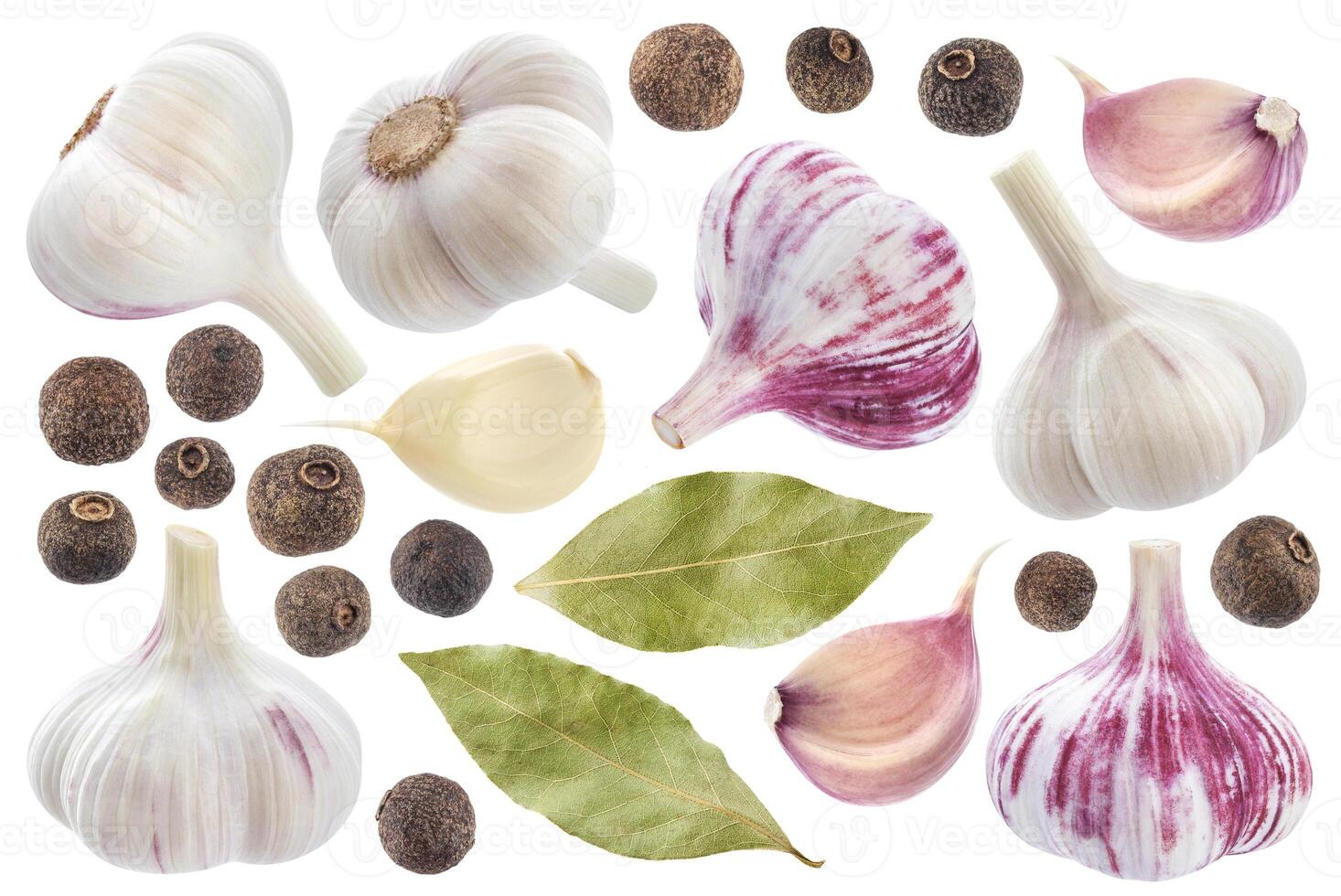 Garlic, allspice and bay leaf isolated on white photo