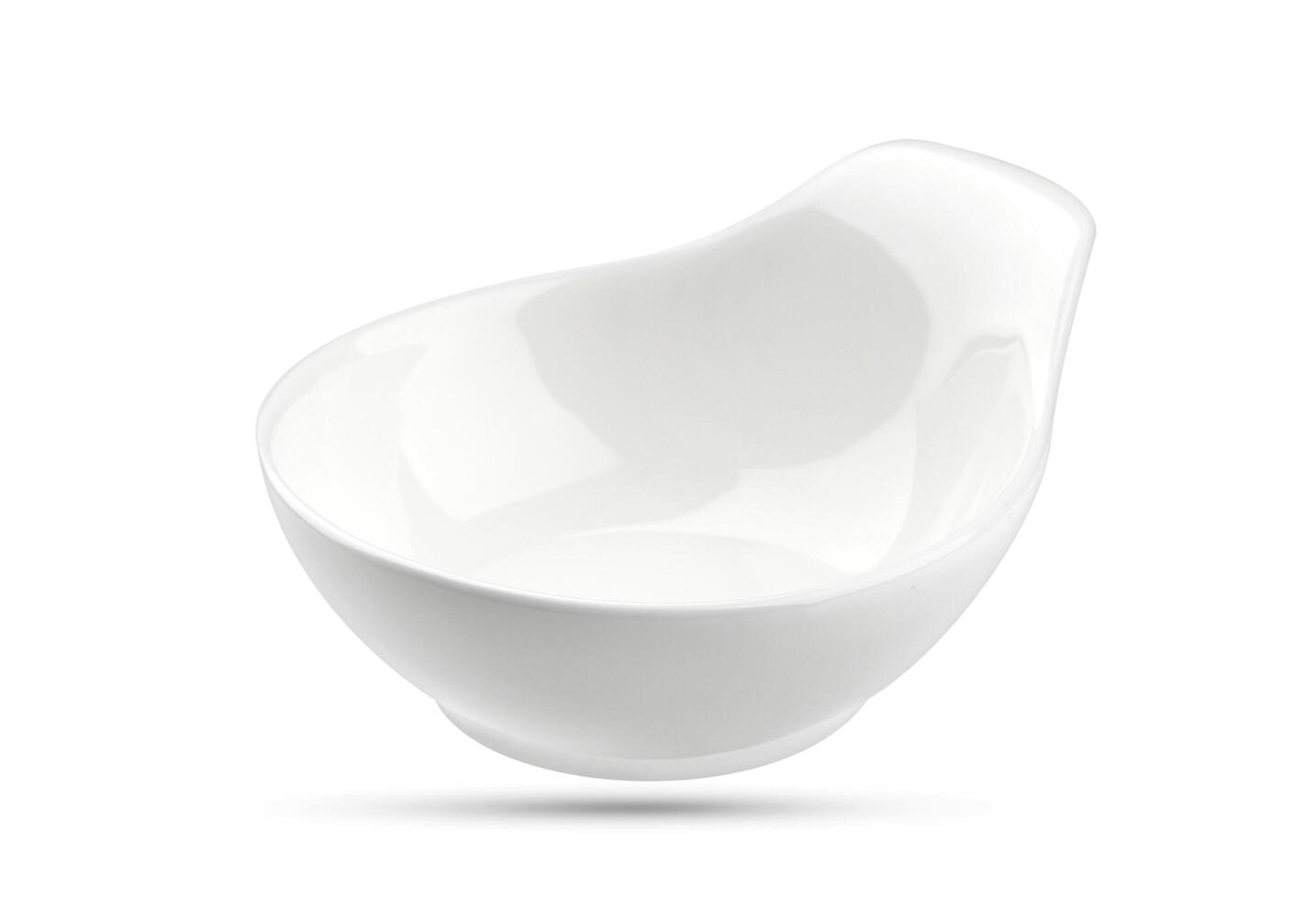 Empty bowl isolated on white background photo