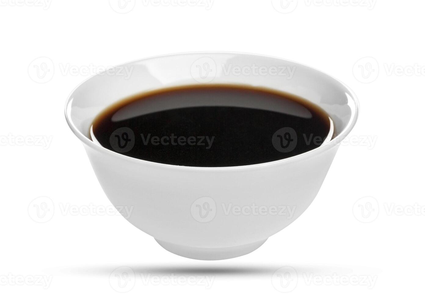 Soy sauce in bowl isolated on white background, with clipping path photo