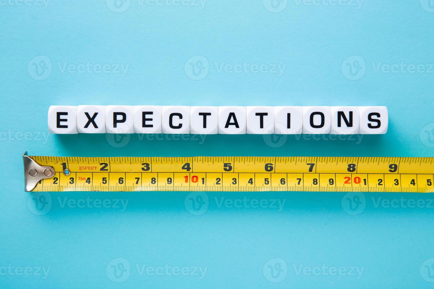 Tape measuring with Expectations word. Evaluation Concept photo