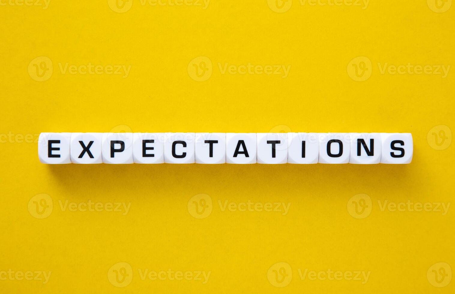 Expectations word on yellow background. Evaluation Concept photo