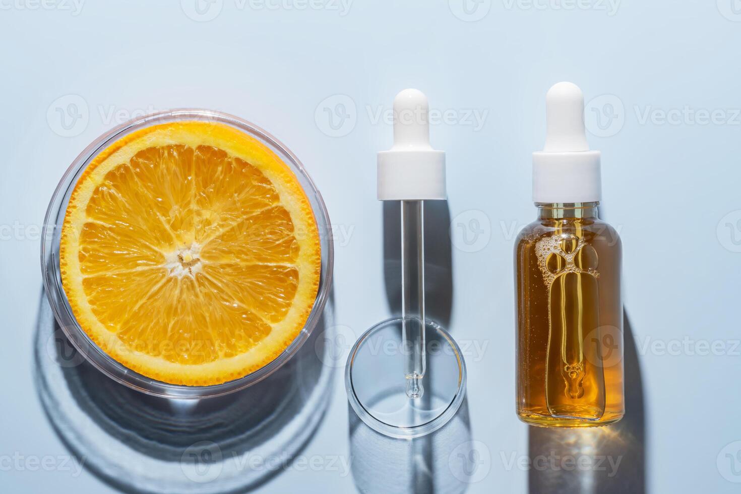 Natural cosmetics laboratory research, bio science, organic skin care, orange fruits and cosmetic oils, beauty from nature. AHA exfoliation testing photo