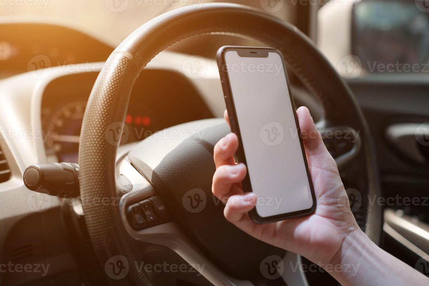 Phone in car, hand using smartphone on car photo