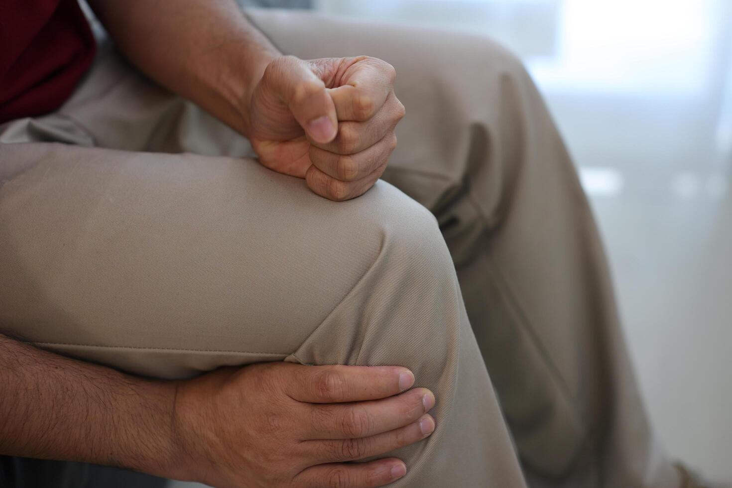 Knee massage to relieve pain, osteoarthritis, knee pain, knee inflammation photo