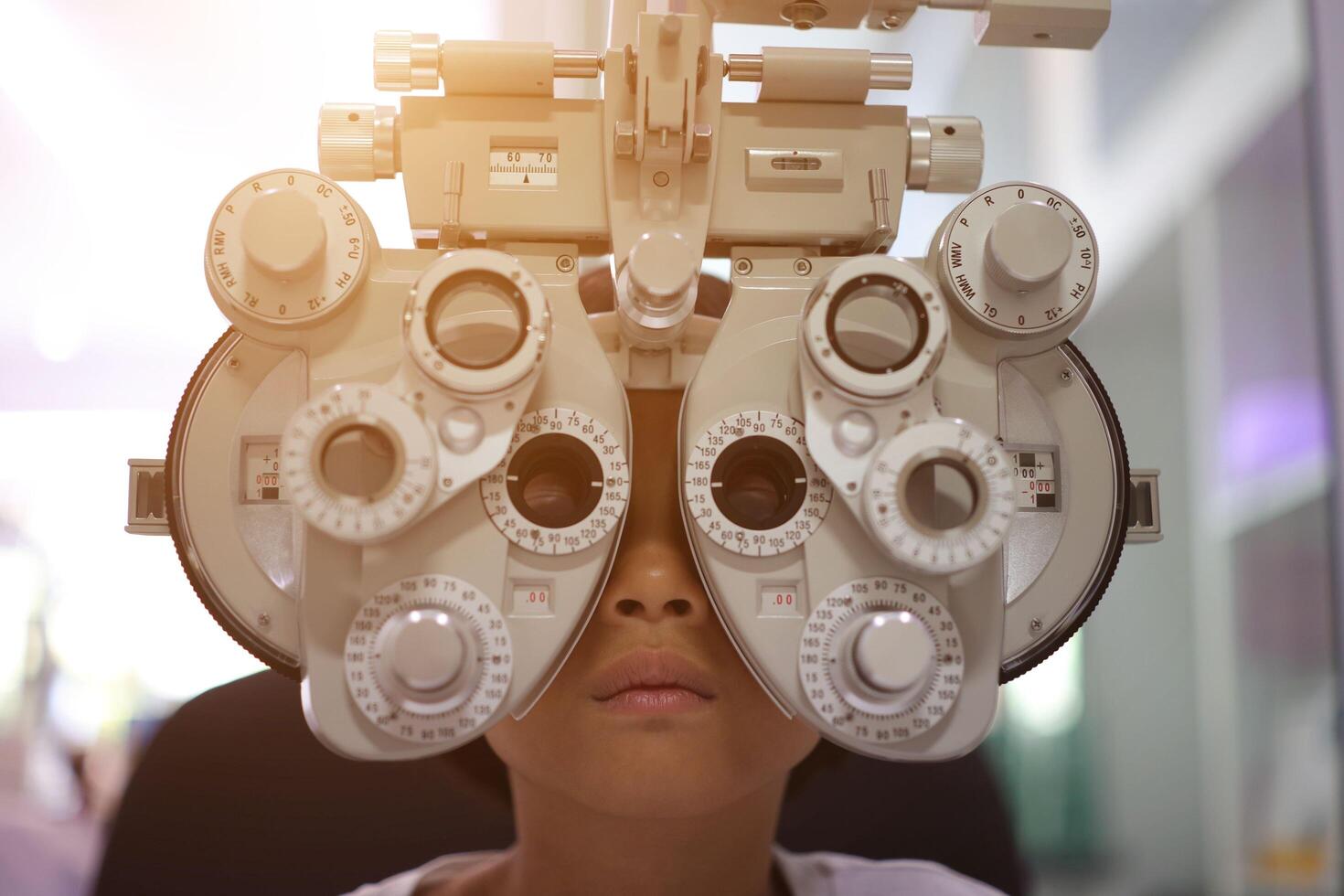 Child eye exam, kid eye test, Phoropter eye test photo