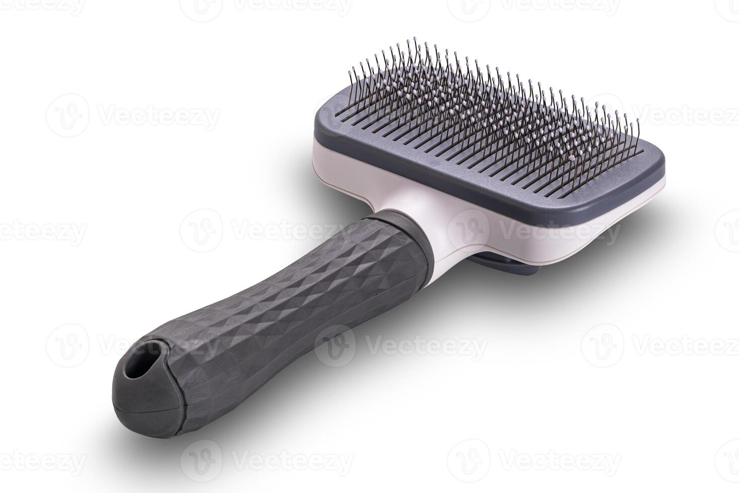 High angle view of pet slicker brush isolated on white background with clipping path. photo